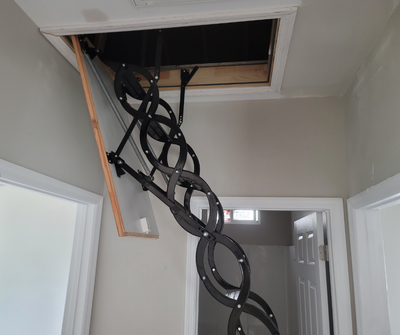 Custom right installed metal scissor attic ladder